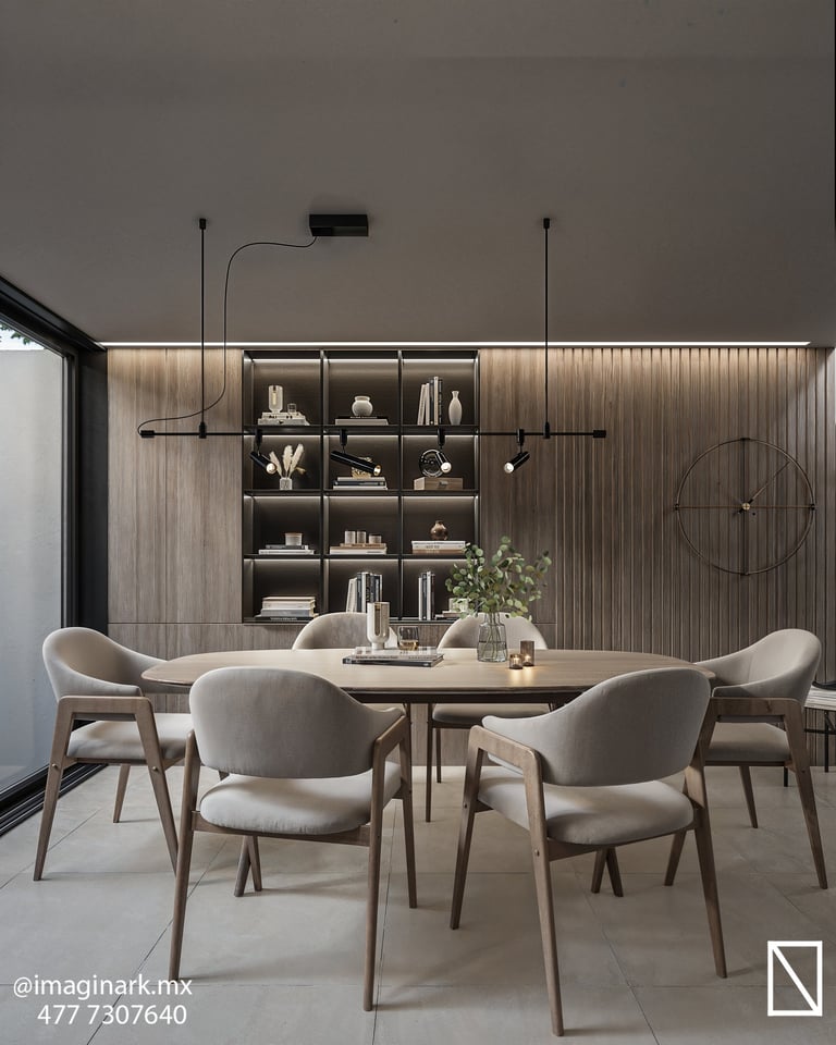 Comedor moderno con mesa redonda, sillas grises y lámparas colgantes