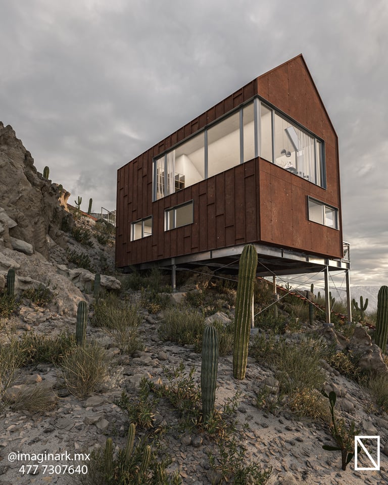 Casa cúbica moderna con revestimiento metálico color óxido elevada sobre el desierto